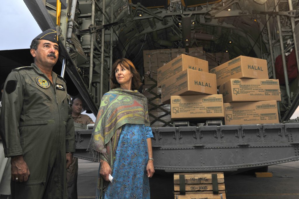 Maj. Gen. Sohail Shafkat, Air Officer Commanding for Northern Air Command in Pakistan, and Elizabeth Rood, Consul General at the U.S. Consulate General in Peshawar, stand next to thousands of Halal meals that were delivered by a C-130H assigned to the 455th Air Expeditionary Wing from Bagram Airfield, Afghanistan, Aug. 1, 2010. Floods Monsoon floods brought on by torrential rains have in Pakistan have devastated hundreds of thousands. (U.S. Air Force photo/Staff Sgt. Christopher Boitz)